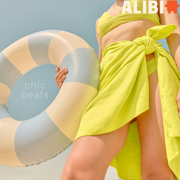 Woman in a swimsuit holding an inflatable