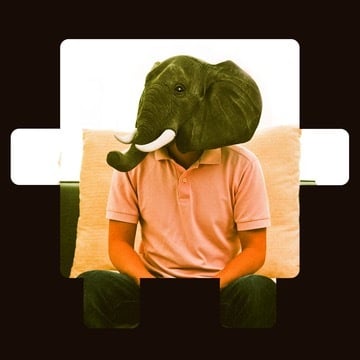 Person with an elephant head sitting on a couch