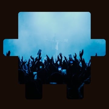 Crowd with raised hands at a concert in blue lighting