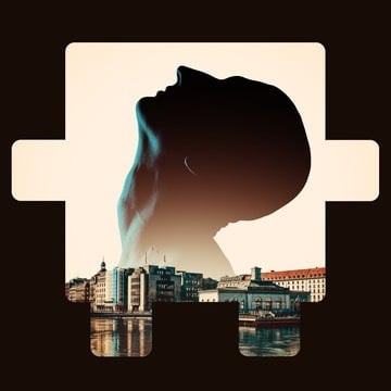 Silhouette of a face blended with a cityscape