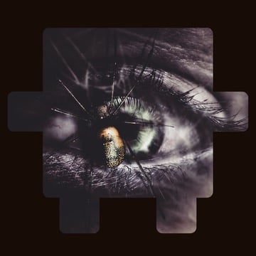 Close-up of an eye with dramatic lighting