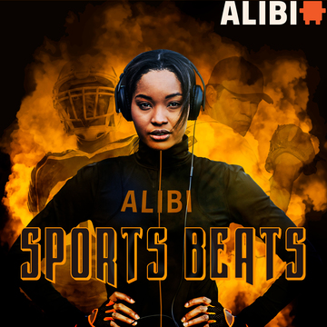 Woman listening to music while standing